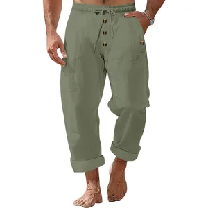 Close-up of men's loose linen casual pants with drawstring and button details
