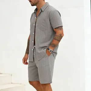 Detailed shot of men's grey pinstriped linen shirt and shorts casual summer set