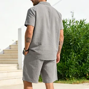 Back view of a men's grey linen striped short sleeve shirt and shorts casual set