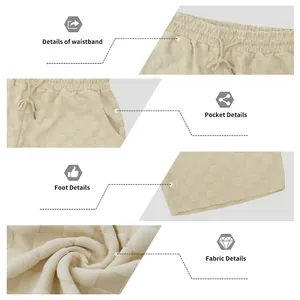 Detailansicht der Herren-Shorts mit Karomuster, Bund und Stoffstruktur im Fokus