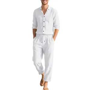 Men's white linen casual two-piece set with long sleeve shirt and drawstring pants.
