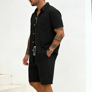 Detailed view of men's black pinstripe linen shirt and shorts casual summer set