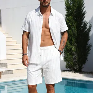 Men's white vertical striped linen shirt and shorts set shown on a model by a pool