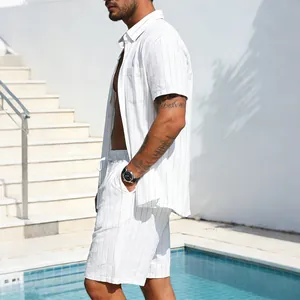 Detailed side view of men's white striped linen short sleeve shirt and shorts set