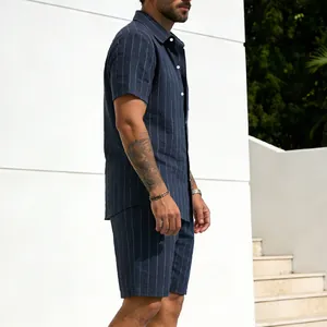 Detailed view of men's navy blue pinstripe linen shirt and matching shorts set