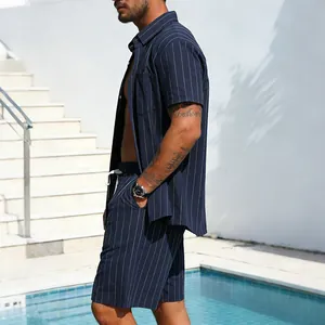 Detailed side view of navy blue striped linen shirt and shorts set for men poolside
