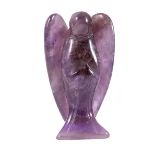 Detailed view of a hand-carved natural amethyst crystal angel figurine decoration