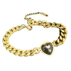 Luxury gold-plated stainless steel Cuban chain bracelet with black heart centerpiece pendant