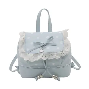 Grazioso mini zaino azzurro a pois bianchi con pizzo e dettaglio a fiocco.