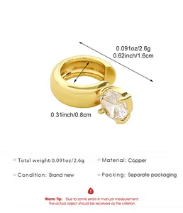 Detailed view of gold-plated copper ear cuff with large zircon and dimensions.