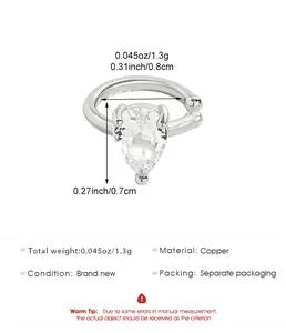 Close-up view of silver teardrop zircon ear cuff with specific size and weight