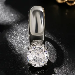 Detailed view of a luxury silver-toned ear cuff with a large brilliant-cut round zircon
