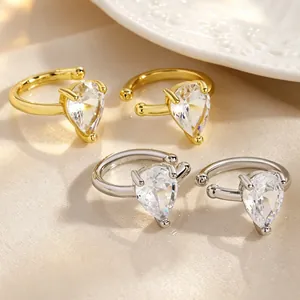 Elegant pear-cut cubic zirconia ear cuffs in gold and silver, non-pierced design.