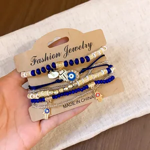 Vintage boho style 6pcs beaded bracelet set featuring evil eye and hamsa hand charms