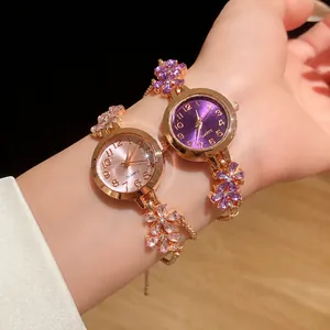 Montre bracelet élégante en strass avec chaîne réglable pour femme, tons or et violet