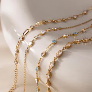 Detail view of elegant 18k gold plated stainless steel bracelets with sparkling CZ stones.