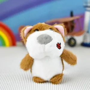 Detailed view of a cute brown and white plush dog keychain with heart embroidery