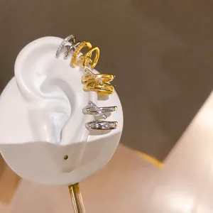 Ear cuffs de doble capa de circón con motivos de estrellas para orejas no perforadas