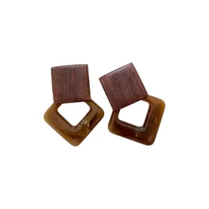 Vintage geometric dangle earrings with wood grain texture and amber acrylic square frames