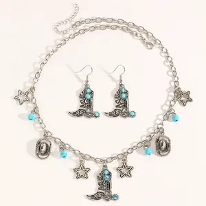 Detailed view of silver-toned Western cowboy jewelry set with turquoise beads and charms.