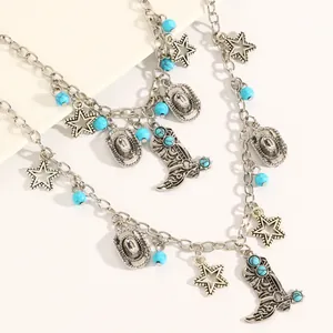 Detail view of Western cowboy necklace with turquoise beads, stars, and boot charms