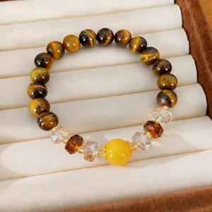 Pulsera vintage de cuentas de vidrio ojo de tigre con cristales facetados y cuenta amarilla