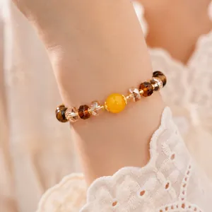Pulsera vintage de cuentas de vidrio estilo ojo de tigre con piedra central amarilla