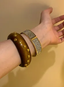 Vintage wide wood bracelet with gold studs and sparkling rhinestone bangle set on wrist