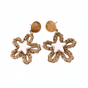 Handmade woven straw flower earrings with white star pendant for beach holiday style