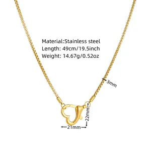 Detailed view of gold heart carabiner necklace with dimensions and material specs