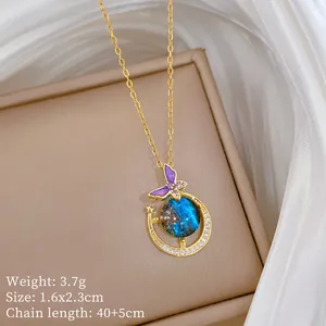 Detail of titanium steel necklace featuring starry stone pendant with crystal moon and butterfly