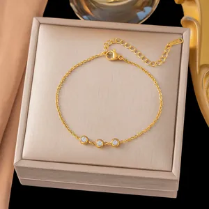 Elegante pulsera de acero inoxidable chapada en oro de 18 quilates con tres cristaux en caja regalo