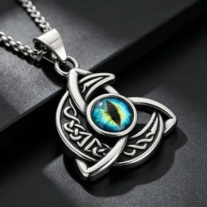 Detailed close-up of a vintage Celtic knot pendant with a blue eye stone in stainless steel.