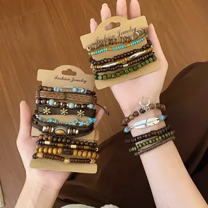 Detailed view of Bohemian beaded and leather bracelet sets on cardstock and wrist