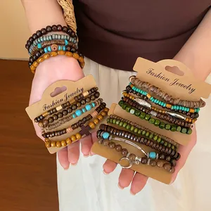 Detailed shot of bohemian beaded bracelet sets featuring wood and turquoise accents