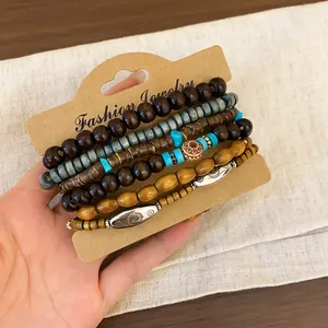 Detail shot of bohemian beaded bracelet set with natural wooden beads and turquoise