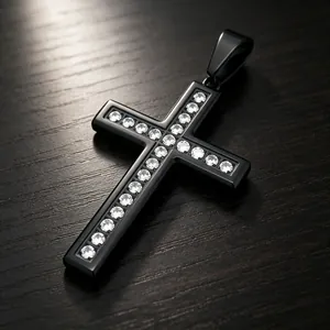 Detail shot of black titanium steel cross pendant with sparkling inlaid crystals