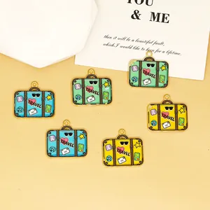 Detailed view of colorful enamel travel suitcase charms for DIY jewelry making items