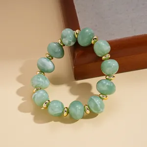 Elegant retro green marbled acrylic beaded bracelet with gold spacers for women's gift