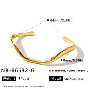 Detail of gold wave-shaped stainless steel cuff bracelet with dimensions and weight info