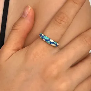 Exquisite handmade cloisonné enamel ring featuring colorful blue and green dripping oil patterns