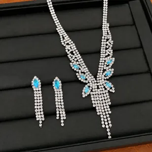 Set di gioielli di lusso color argento con nappe in zircone blu e collana elegante