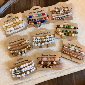 Bohemian multi-layer beaded bracelet sets with various charms on brown display cards