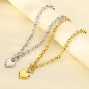 Gold and silver stainless steel heart pendant necklaces with OT clasp toggle jewelry.