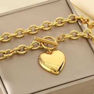 Chunky stainless steel gold chain necklace with a 3D heart pendant and OT clasp