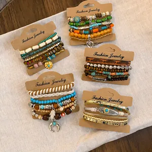 Collection of Bohemian multi-layer leather beaded bracelet sets featuring unique charms