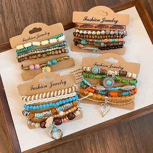 Detailed view of colorful bohemian multi-layer beaded leather bracelet sets with charms