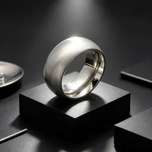 Professional macro detail of brushed stainless steel ring with polished inner surface and sleek design