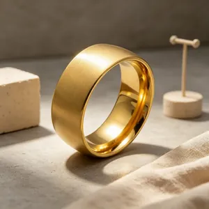 Close-up detail of golden titanium steel ring with brushed exterior and polished interior