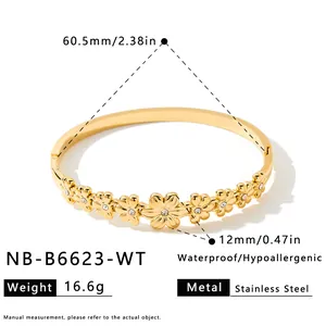 Vergulde roestvrijstalen bloemenarmband met zirkonia, afmetingen en gewichtsopgave.